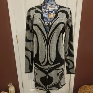 Black and silver open front sweater jacket.